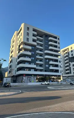 a large apartment building on the side of a street at Aurora Mare in Bar
