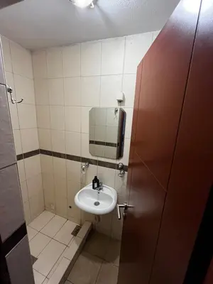 a bathroom with a sink and a mirror at Krsto in Budva