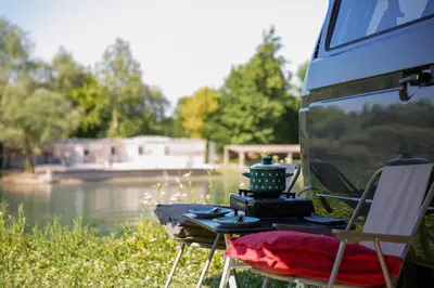 a table and chairs in the back of a van at Camperlife Montenegro in Podgorica