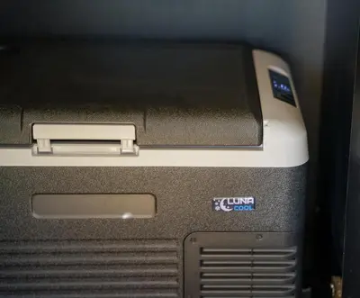a laptop computer sitting on top of a shelf at Camperlife Montenegro in Podgorica