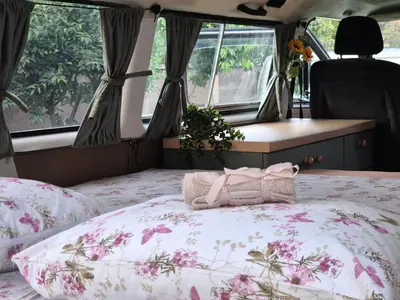 a bed in the back of a camper van at Camperlife Montenegro in Podgorica