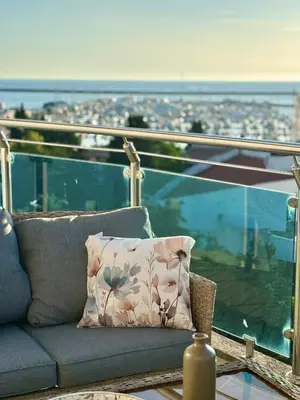 a couch with a pillow on top of a building at Mia Bella in Bar