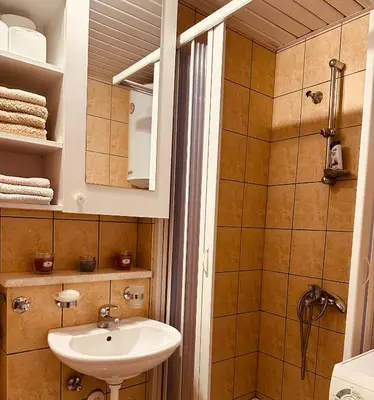 a bathroom with a sink and a shower at Levant in Sutomore