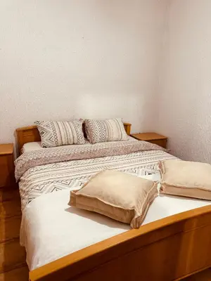 two beds sitting next to each other in a bedroom at Levant in Sutomore