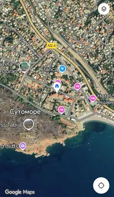 a map of a city with buildings and the water at Sofi in Sutomore