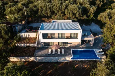 an aerial view of a house with a swimming pool at Villa Amara -Luxury Villa with Private Pool & Hot Tub in Bar
