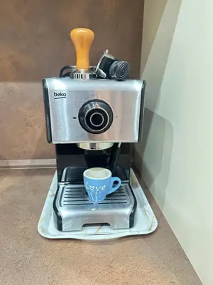 a coffee maker with a camera on top of it at Lux apartman sa garažom in Budva