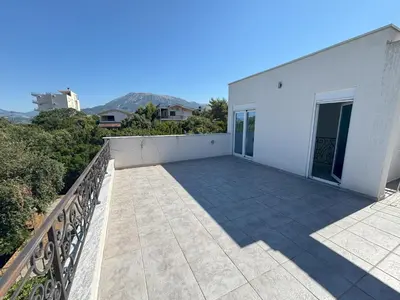 a balcony of a white building with a fence at Villa Diel 300m vom Strand in Utjeha