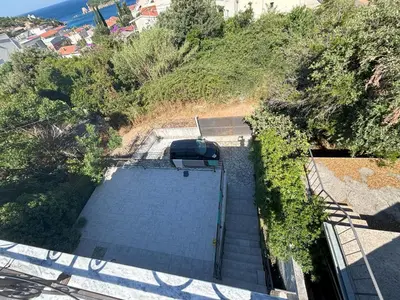 an overhead view of a stairs with a car on it at Villa Diel 300m vom Strand in Utjeha