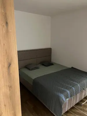 a bedroom with a bed in a room at Kasia in Kravlja