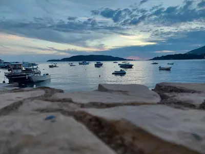 a group of boats in a body of water at Apartment Vidakovic in Budva