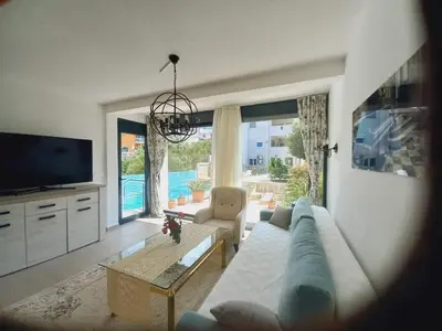 a living room with a couch and a table at Villa Nuna in Bar