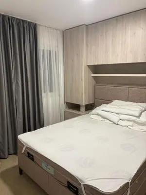 a bedroom with a large bed in a room at Njaro Del Mar AS in Petrovac na Moru