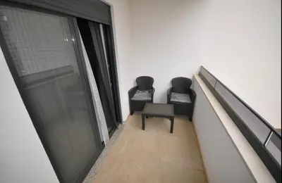 two chairs sitting on a staircase in a building at New Studio - Dobra Voda in Dobra Voda