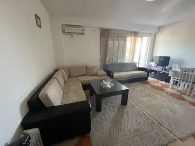 a living room with a couch and a coffee table at Pico apartments in Ulcinj