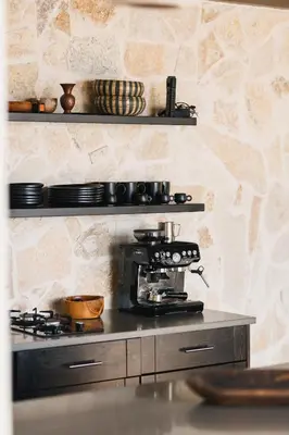 a kitchen with a coffee maker on a counter at Cottage REE in Ulcinj