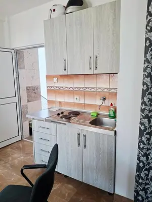 a kitchen with a sink and a counter top at Apartman OAZA 3 in Ulcinj