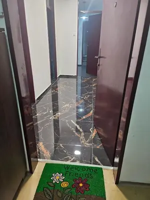 a welcome mat on the floor of a hotel elevator at Apartman Mateo in Cetinje