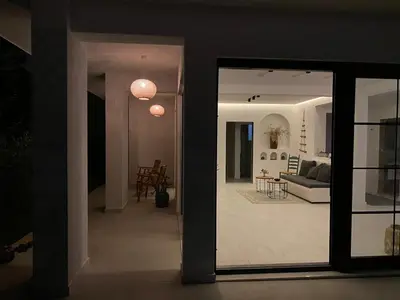 a view of a living room through a glass door at Carpe Diem 1 in Ulcinj