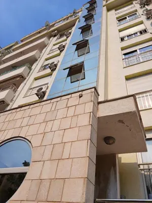 a building with windows on the side of it at Apartment EVA in Budva - 55 m2 in Budva