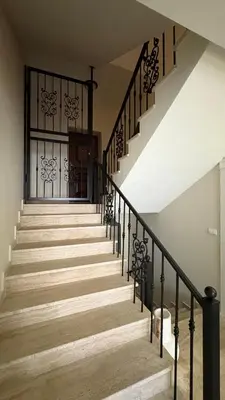 a set of stairs with a glass door at Zaytoon Residence in Ulcinj