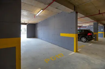 a parking garage with a car parked in it at Adriatic calm Terrace & Parking in Becici