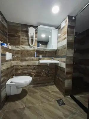 a bathroom with a toilet and a sink at sar 5 in Kotor