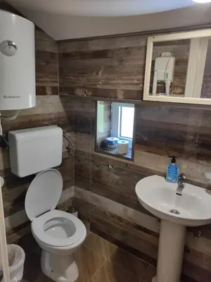 a bathroom with a toilet and a sink at sar 6 in Kotor
