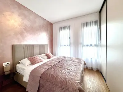 a bedroom with a bed and a large window at Apartment BAR M3A sea view in Bar