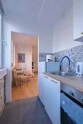 a kitchen with a sink and a counter top at 086 Studio Apartment in Cetinje