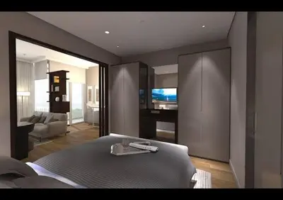 a bedroom with a bed and a living room at Aurora suit in Podgorica
