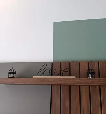 a wooden counter with two lights on top of it at Bienvenue chez nous studio in Ulcinj