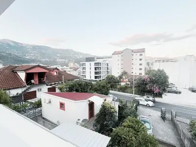 a view of a city with buildings and a street at Lalic House Budva in Budva