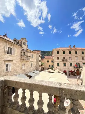 a view of a city from a balcony at Private room Shared bathroom and kitchen in Kotor