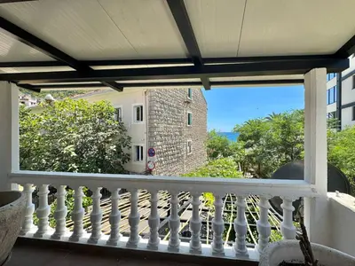 a view from the balcony of a house at Beachfront Holiday Home Rafailovici in Becici