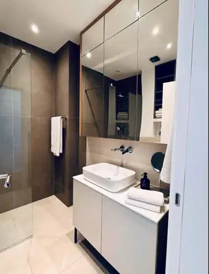 a bathroom with a sink and a shower at Apartman Gioia in Becici