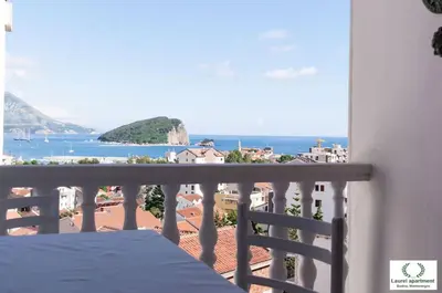 a balcony with a view of the ocean at Laurel Apartment See View in Budva