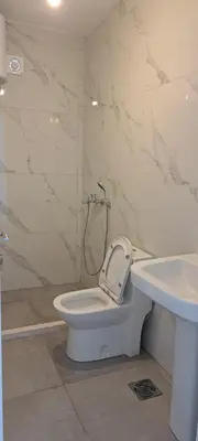 a bathroom with a toilet and a sink at Apartments Arb in Ulcinj