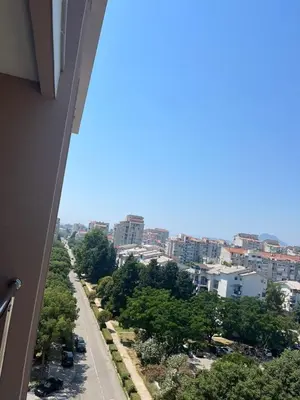 a view of a city street with trees and buildings at Amber Sky Apartments in Bjeliši