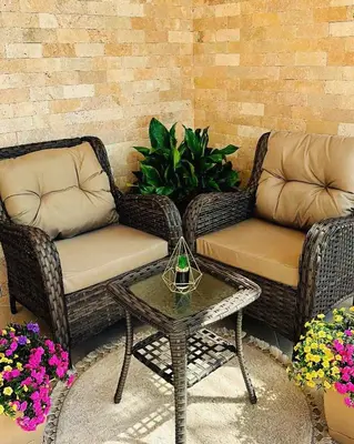 two wicker chairs and a coffee table on a patio at Villa Doda - Donji Stoj - Ulcinj in Ulcinj