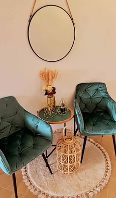 two green chairs and a table with a mirror at Villa Doda - Donji Stoj - Ulcinj in Ulcinj