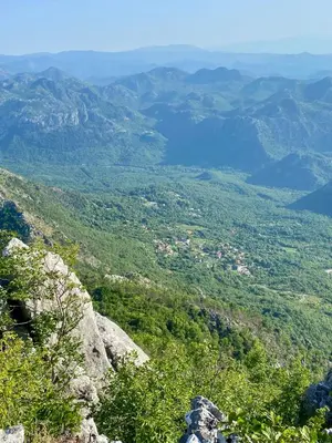 a view of a valley from the top of a mountain at Rudinica Baseglamp in Gornji Brčeli