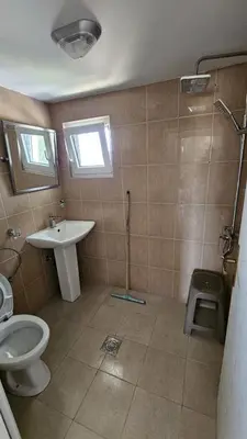 a bathroom with a toilet and a sink at Villa With Swimming Pool in Ulcinj