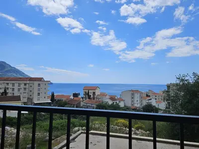 a view of the ocean from a balcony at Apartament Onyx in Becici