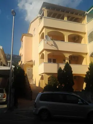 a van parked in front of a building at Villa Nova in Budva