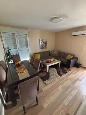 a living room with a couch and a table at Apartman Sonib in Ulcinj