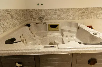 a dirty bath tub in a bathroom at Hotel PIO in Ulcinj