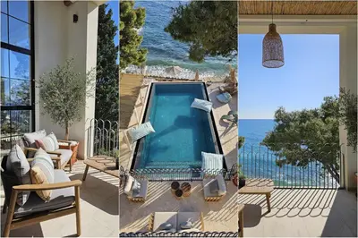 a swimming pool in a house with a view of the ocean at High-End Villa with Private Beach Access in Brca
