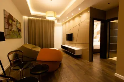 a living room with a couch and a chair at Perla Luxury in Ulcinj