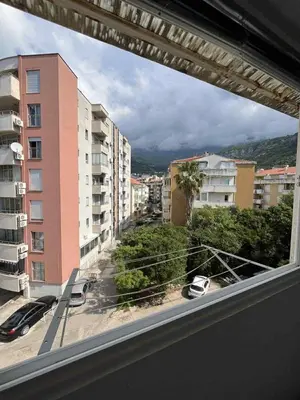 a view from a window of a city with buildings at Marko's place in Budva